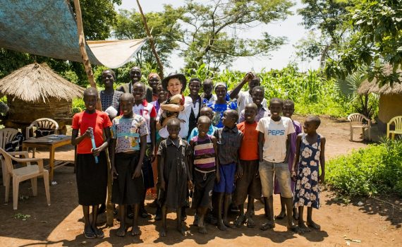 Danielle Cormack meets her sponsored child in Uganda