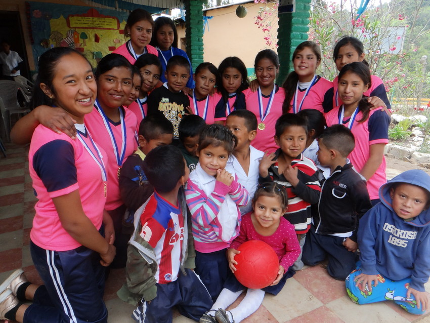 Kelin, 17 (second from left), is the captain of her school's girls' soccer team in rural Honduras. Before ChildFund donated unpoppable soccer balls to her school through One World Play Project's #PassTheHappiness campaign, she and her teammates used to have to borrow soccer balls from the boys just so they could play. Now, they're an award-winning girls' team in their area.